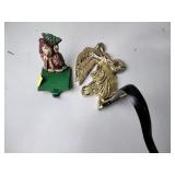 Christmas decor stocking hangers cast iron Santa