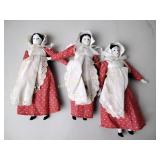 Porcelain and cloth dolls trio small
