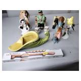 Pottery planters and figurines, fiddle bow bread