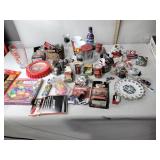 Coca-Cola items including cups, tins, boxes