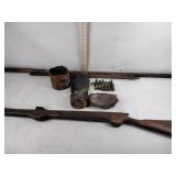 Leather Pouch, wood sticks, part of a rifle,