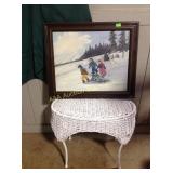 Wicker stand, framed picture