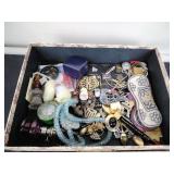 Jewelry box with vintage jewelry, spoons, and