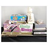 Games, including trivial pursuit, word snag, clue