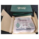 Sheilas, wood cut outs, including  Ellis island,