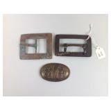 Belt buckles, one marked CMA