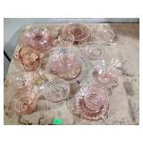 Pink Depression style dishes including plates,