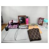 Records, license plate frames, mirror,table