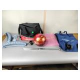 Bowling ball in bag, slingshot brand bar,