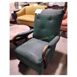 Vinyl upholstered rocker, some wear on arms