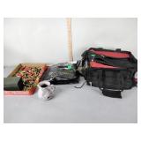 Plastic ammo box with pellets, empty shotgun