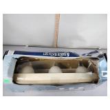 Vanity light set in box, three light vanity