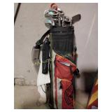 Golf bag with clubs various accessories, clubs