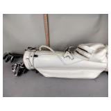 Hogan golf bag with clubs various sizes. Clubs