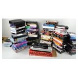 VHS tapes, DVDS, action, romance, comedy, Left