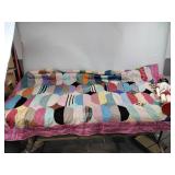 Homemade quilt, nutcracker (missing nose andboots)