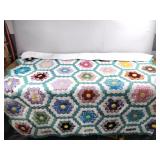 Hand-sewn flower garden quilt
