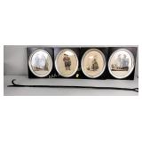 Framed portraits, tapestry, wrought iron poker