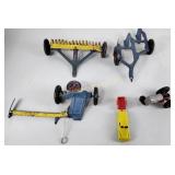 Vintage toys including tin litho tractor