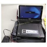 Sony portable DVD player with case, power cords