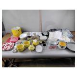 Cake pans, tea pots, measuring glass, butter