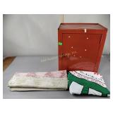 Small orange metal locker measuring approximately