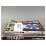 1976 Hummel Collectors Guide book, 2004 Zippo