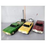 3 radio controlled cars, missing one remote,