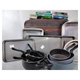 Pots and pans, baking pans, VHS and DVD movies,