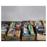 Over sixty open boxes of misc puzzles plus misc