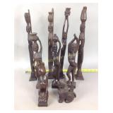 Seven Africa-themed wood sculptures