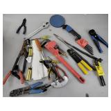 Tools including pipe wrench, screwdrivers, wire
