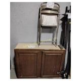 Cabinet 42 x 13 x 31, folding chair