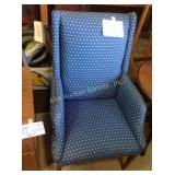 Upholstered armchair, upholstery has some tears