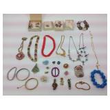 Costume jewelry including bracelets, pins,