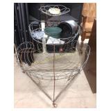 Metal and wire plant stand on casters