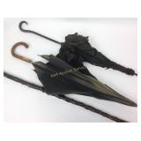 Vintage umbrellas and walking stick