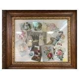 Victorian greeting cards in ornate wood frame