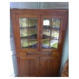 Antique corner hutch, age related wear and tear,