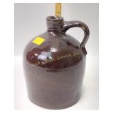 Ceramic jug proximately 7 inches tall