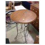 Parlor table, has crack in wooden top, 31 x 23