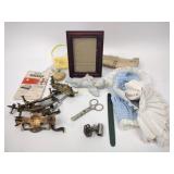 Vintage drawer hardware, doilies, picture frame,