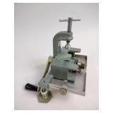 Fabric strip cutter, blue glass vase, basket,