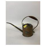 Copper watering can dog motif
