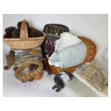 Baskets, pine cones, decorative pillows, faux