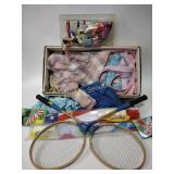 Tennis racquets, kites, fabric pieces, thread