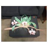 Painted metal orchid wall art. Length: 40"
