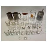 Shot glasses including Dallas Cowboys, and other