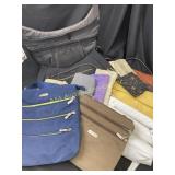 Purses, one with tags, variety of sizes and