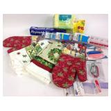 Hot pads, dish towels, comb, Reynolds wrap, pill